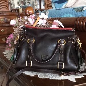 Dooney& Bourke Bag. Approx. 11x7, and about 7 inches deep.  Beautiful dark brown